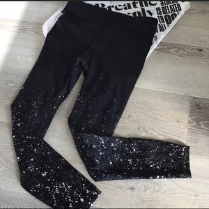 Lululemon black leggings, splatter paint design